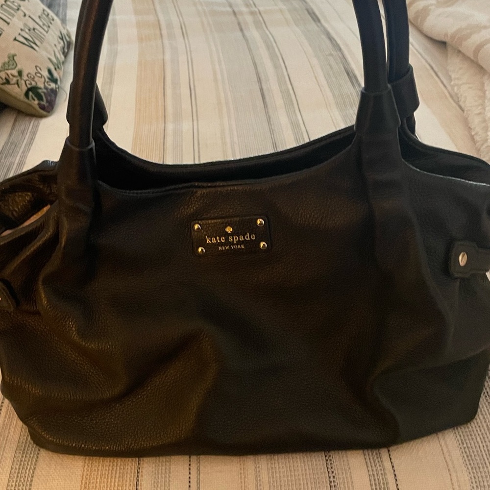 Black pebble leather Kate Spade Bag. Great size and used often.